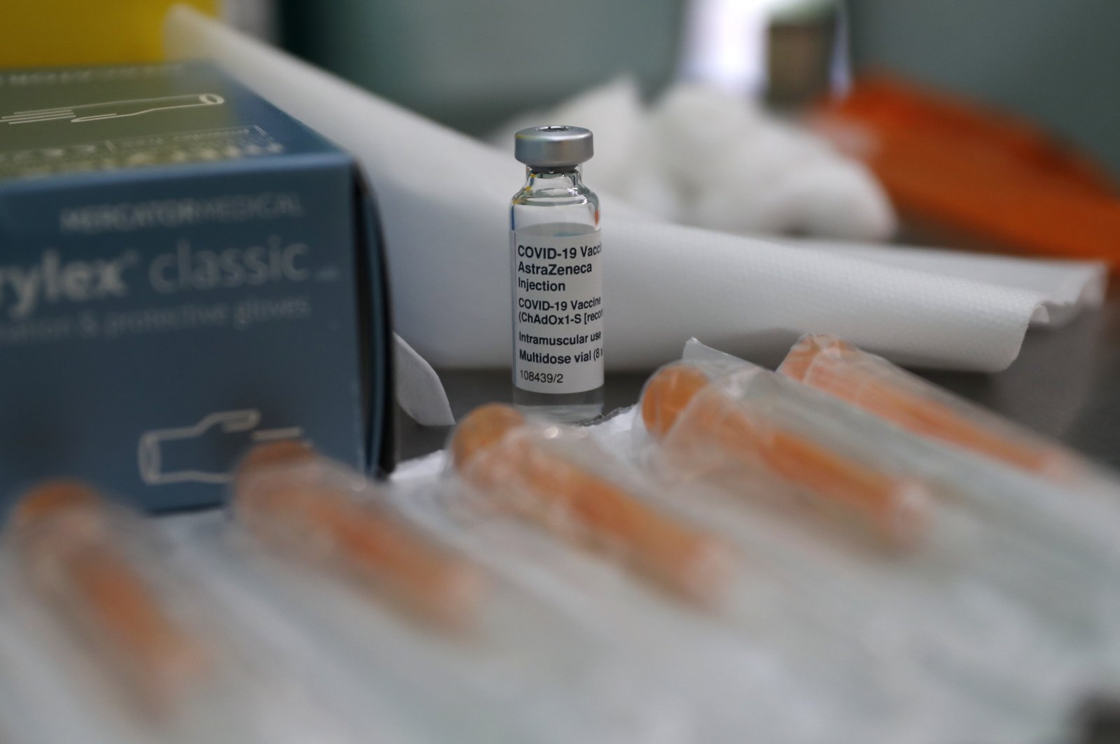 A vial of the AstraZeneca coronavirus vaccine ready for use during the pilot project pop-up vaccination drive 'Vaxi Taxi' in Kilburn, London, Feb. 28, 2021. (AP Photo)