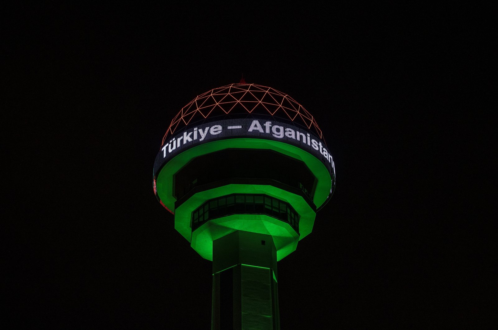 Ankara's landmark Atakule is illuminated by the colors of the Afghanistan flag to mark the 100th anniversary of diplomatic relations between the two countries. (AA Photo)