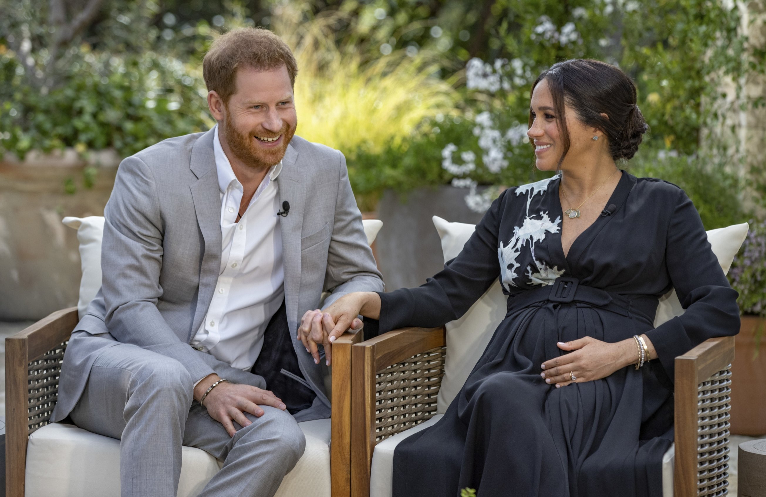 Britain's Prince Harry (L) and his wife Meghan, Duchess of Sussex, speak about expecting their second child with U.S. television host Oprah Winfrey, U.S., March 7, 2021. (AP)