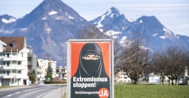 A poster of the initiative "Yes to the burqa-ban" is seen in Oberdorf, in the canton of Nidwalden, Switzerland, Feb. 16, 2021. (EPA Photo)