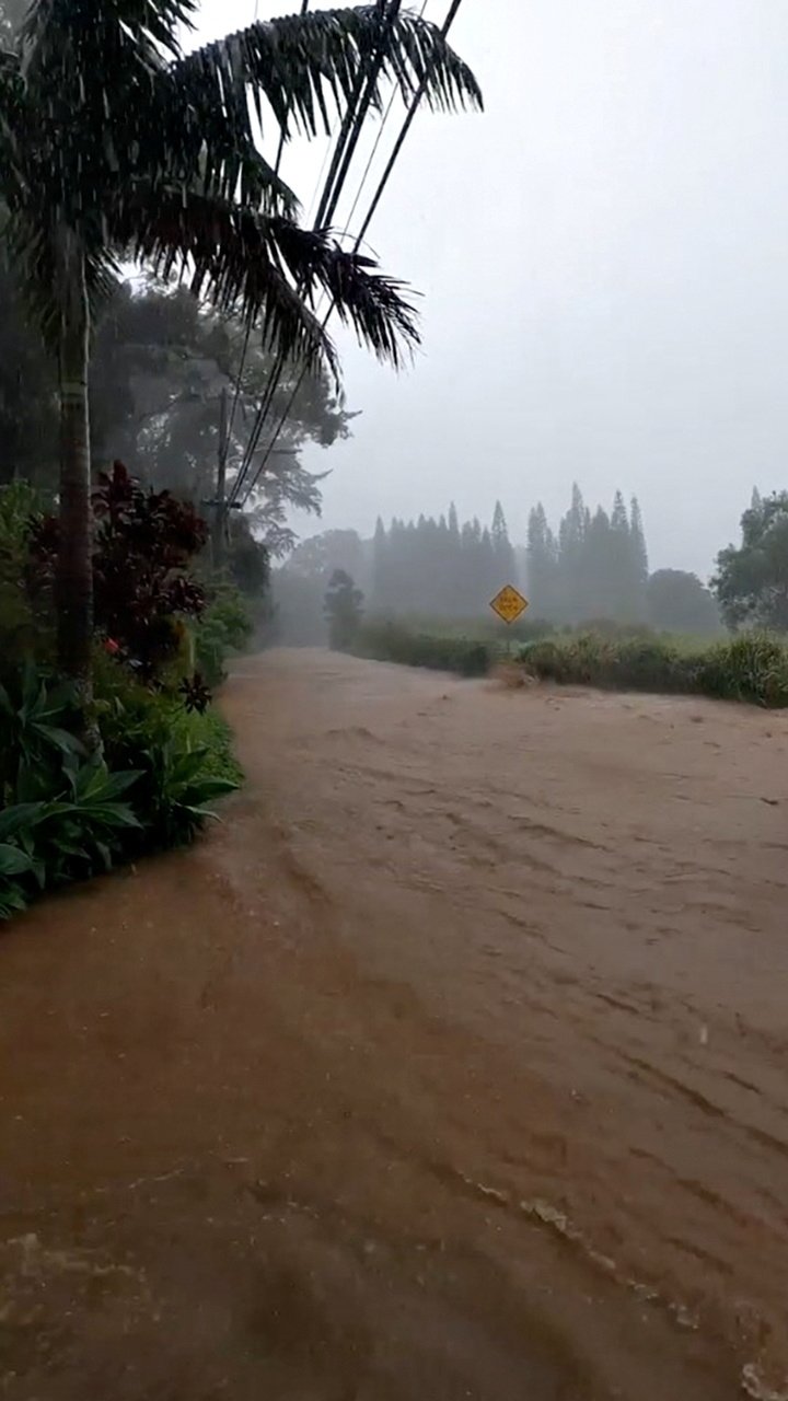 A flooded road is seen near the breached Kaupakalua dam, in Haiku on Maui, Hawaii, U.S., March 8, 2021. (“Monkeys with Drums” website via Reuters)