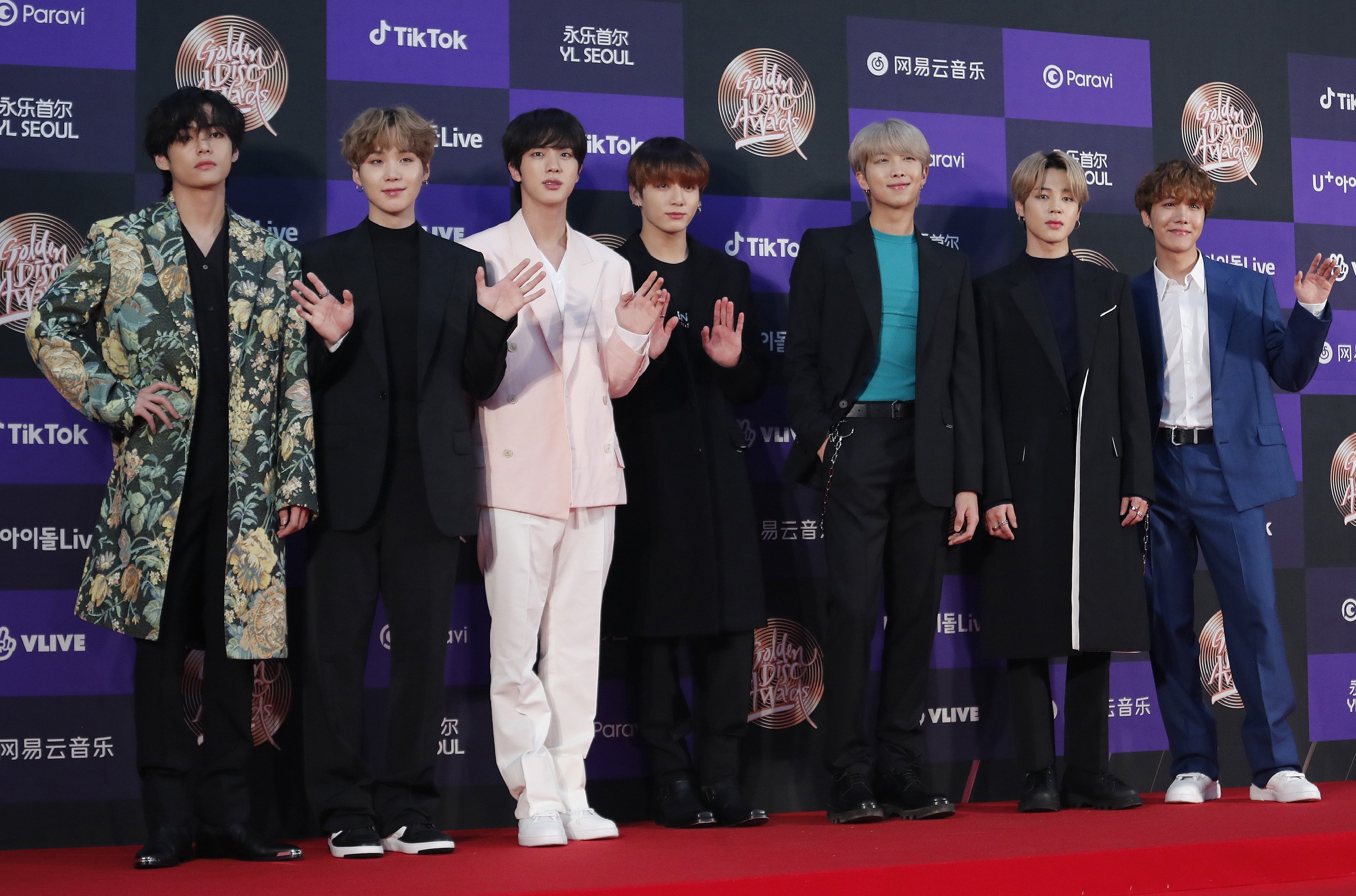 Members of BTS pose for photos during the Golden Disk Awards in Seoul, South Korea, on Jan. 5, 2020. (AP Photo)