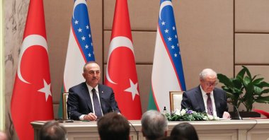 Foreign Minister Mevlüt Çavuşoğlu (L) and his Uzbek counterpart Abdulaziz Kamilov during a press conference, the capital Tashkent, Uzbekistan, March 9, 2021. (AA Photo)