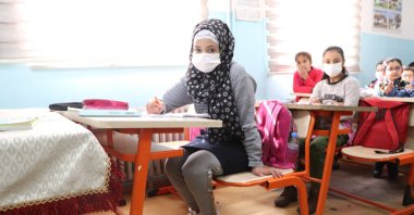 Seyma Elcellud poses in school after having a prosthetic leg operation in Turkey, March 9, 2021. (AA Photo)