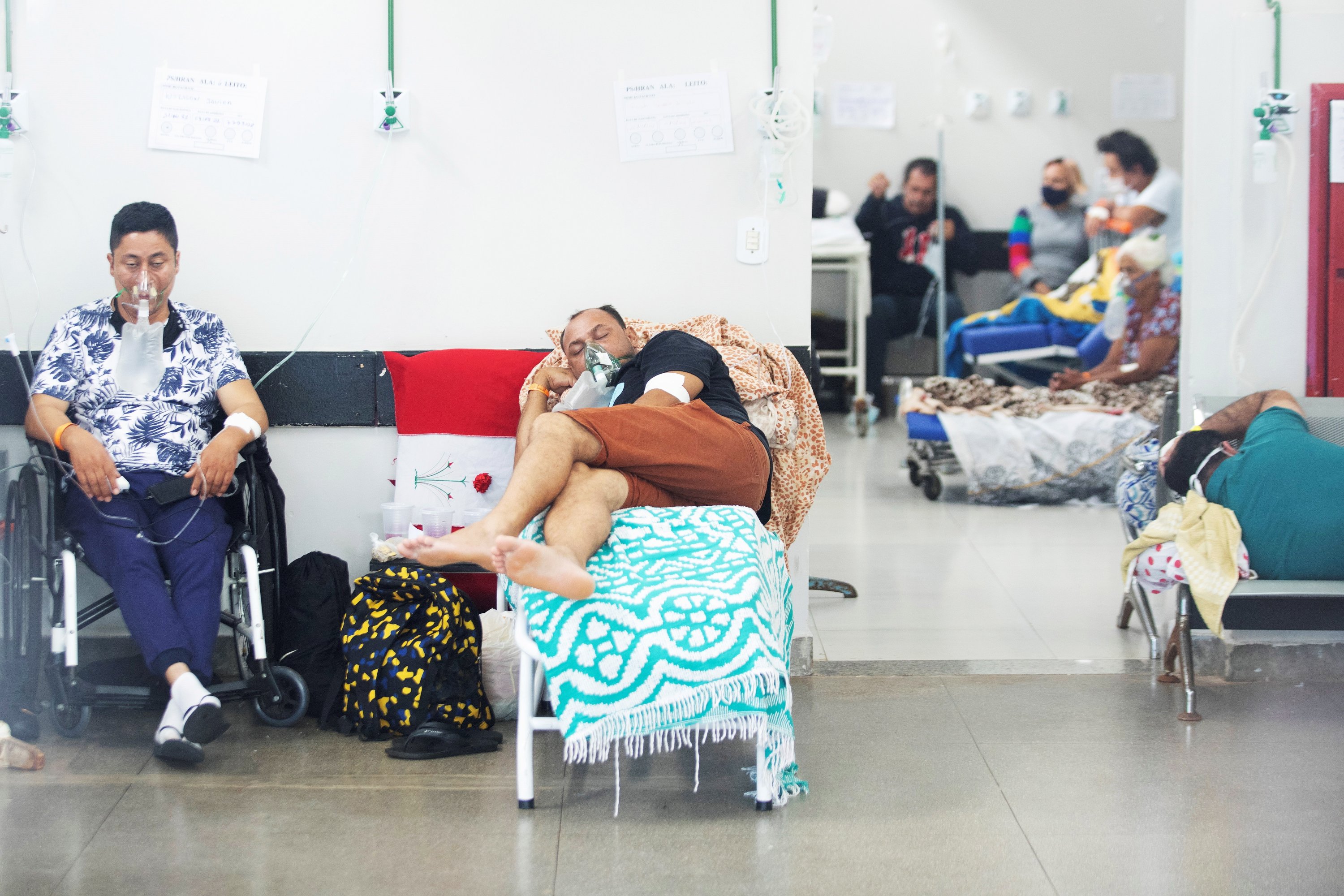 People rest in the corridors of Pronto Socorro Hospital, in Brasilia, Brazil, March 10, 2021. (EPA Photo)