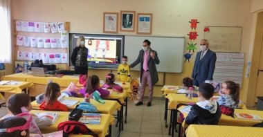 Students continue in-person education by observing coronavirus measures in a school in northwestern Edirne province, March 3, 2021. (IHA Photo)