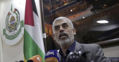 Yehiyeh Sinwar, the Hamas resistance group's leader in the Gaza Strip, speaks to foreign correspondents, in his office in Gaza City, May 10, 2018. (AP Photo)