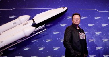 SpaceX owner and Tesla CEO Elon Musk poses after arriving on the red carpet for the Axel Springer award, in Berlin, Germany, 01 December 2020. (EPA Photo)