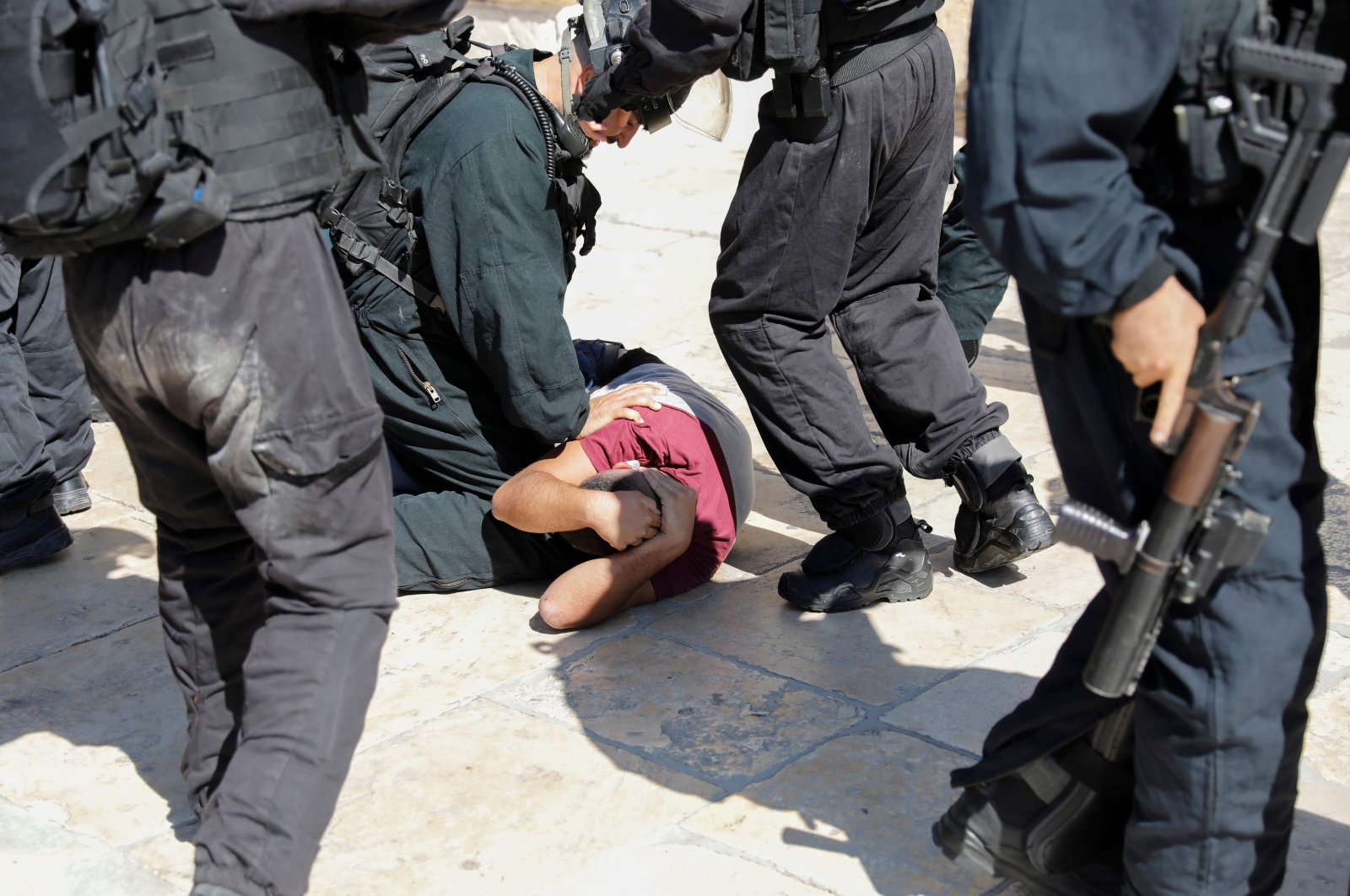 Israeli security forces detain a Palestinian at the Al-Aqsa Mosque compound in the Old City of Jerusalem, Israel, Aug. 11, 2019. (AFP Photo)