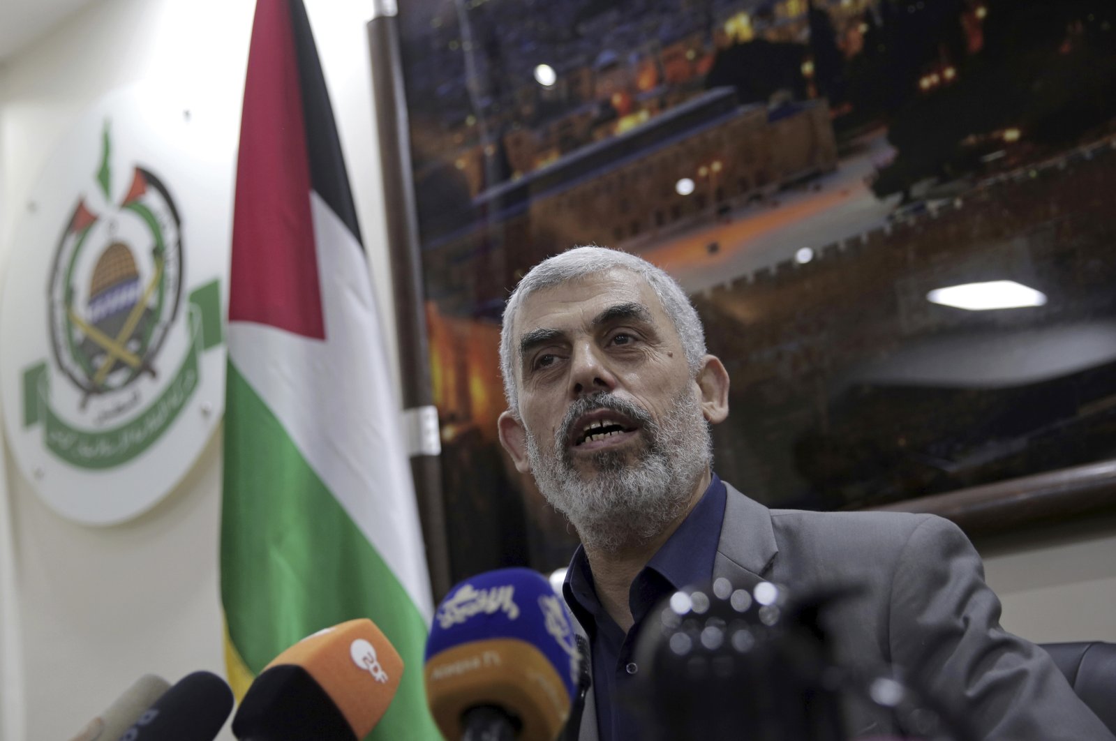 Yehiyeh Sinwar, the Hamas resistance group's leader in the Gaza Strip, speaks to foreign correspondents, in his office in Gaza City, May 10, 2018. (AP Photo)