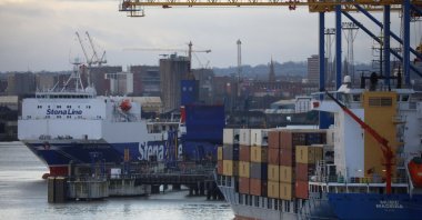 A Stena Line Irish sea ferry is berthed next to a container ship at the Port of Belfast, Northern Ireland, Jan. 2, 2021. (Reuters Photo)