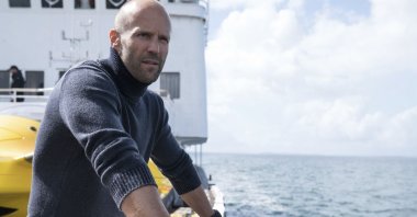 Actor Jason Statham looks into the distance in a scene from the 2018 action flick “The Meg.” (Archive Photo)