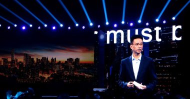 Simon Hu, CEO of Ant Group, is seen on a giant screen as he delivers a speech at the INCLUSION Fintech Conference in Shanghai, China, Sept. 24, 2020. (Reuters Photo)