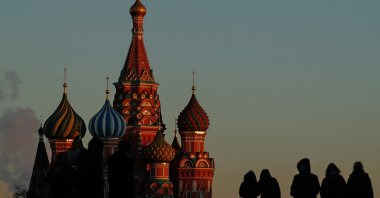 People walk along Red Square in front of St. Basil's Cathedral in Moscow, Russia March 11, 2021. (Reuters Photo)