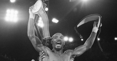 In this November 1983 file photo, Marvin Hagler celebrates his unanimous-decision victory over Roberto Duran in a boxing bout in Las Vegas. (AP Photo)