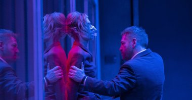 Elizabeth Debicki (L) as Kat and Kenneth Branagh as Andrei Sator in "Tenet".