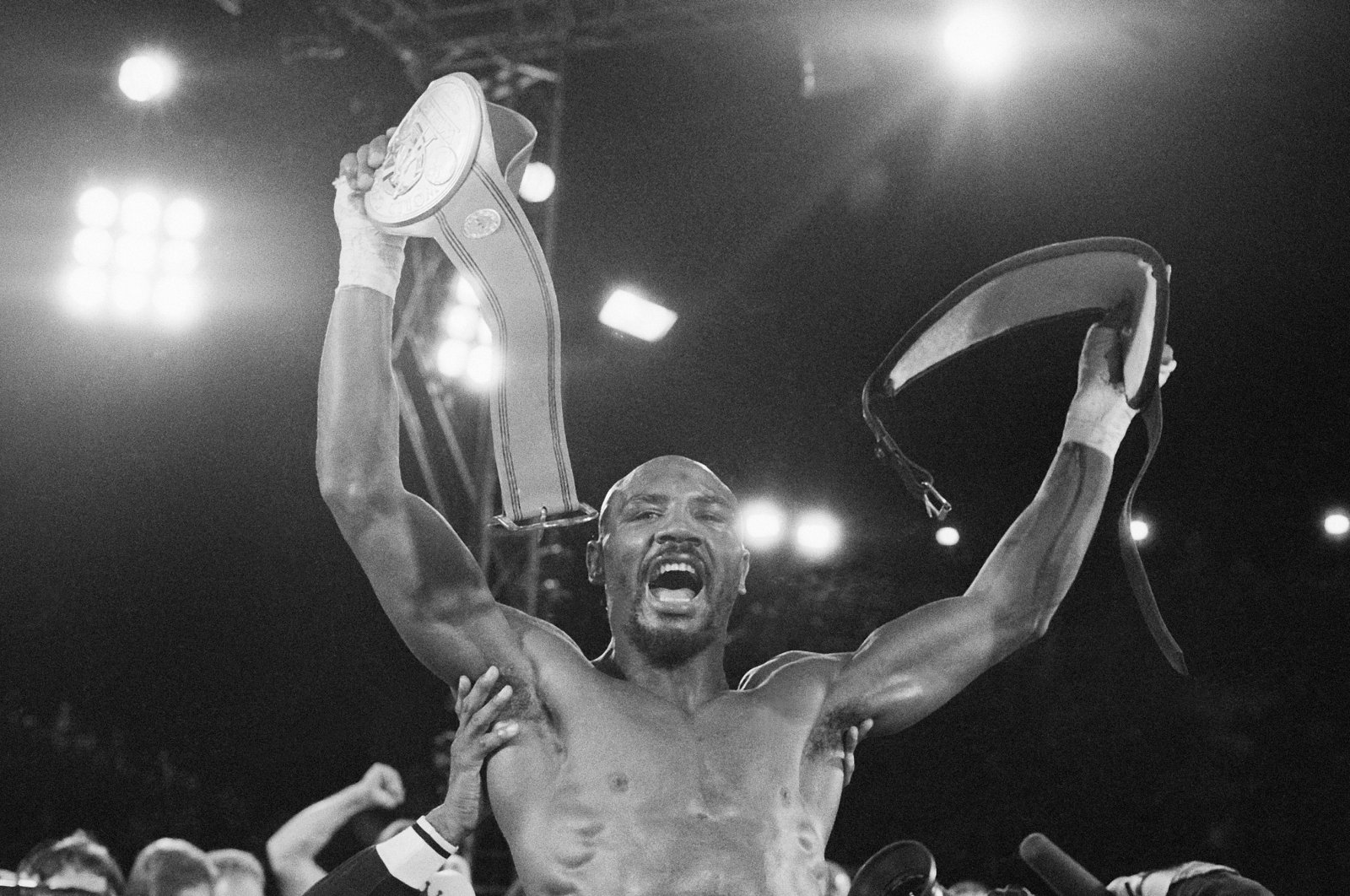 In this November 1983 file photo, Marvin Hagler celebrates his unanimous-decision victory over Roberto Duran in a boxing bout in Las Vegas. (AP Photo)