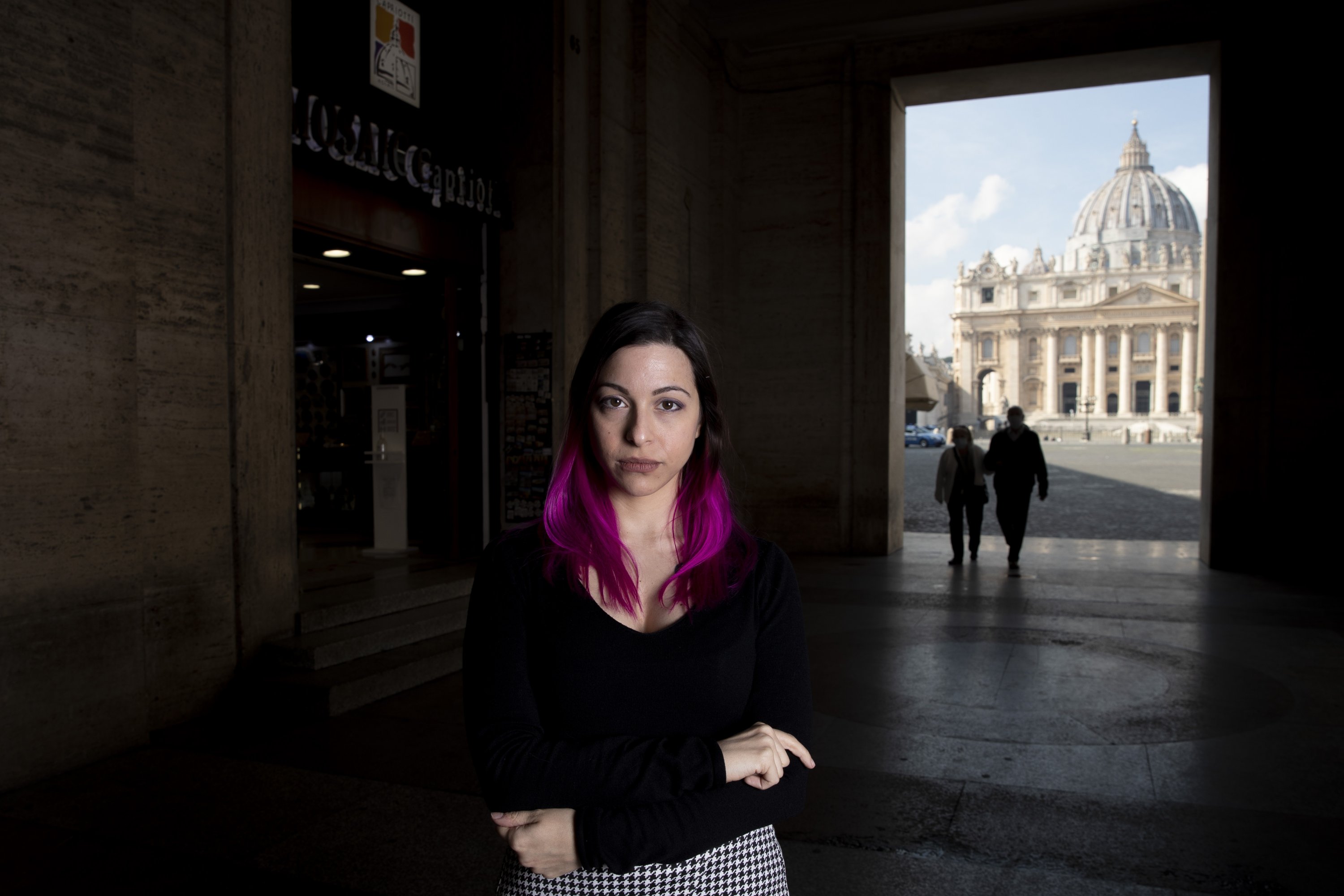 Tour guide Laura Taddeo poses for a portrait in front of the Vatican, Italy, March 4, 2021. (AP Photo)