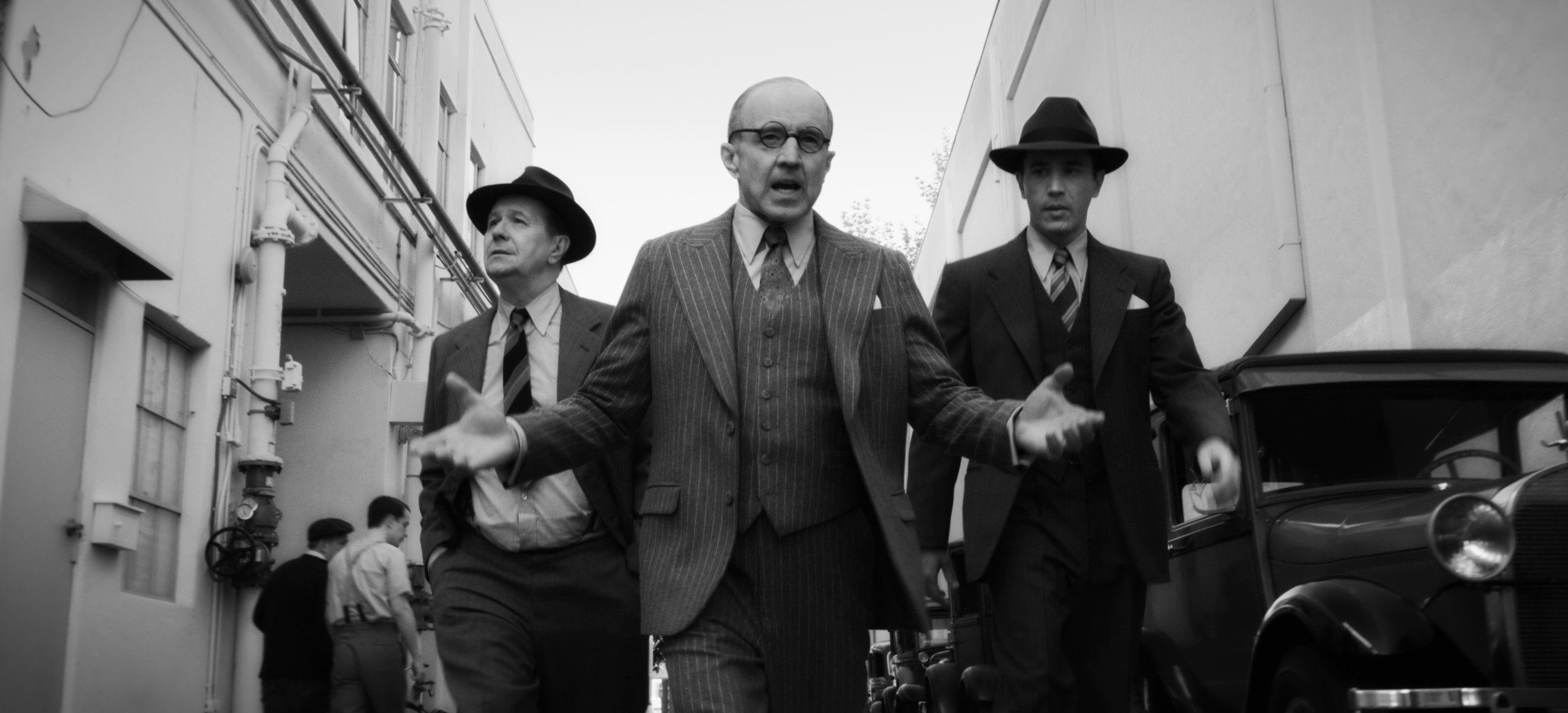 Gary Oldman as Hermann Mankiewicz, Arles Howard as Lewis B Mayer and Tom Belfry as Joe Mankiewicz in a scene from the movie 