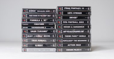 A collection of original Sony PlayStation 1 arcade video games in London, U.K., May 7, 2020. (Shutterstock Photo)