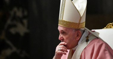 Pope Francis listens to Filipino Cardinal Luis Antonio Tagle during a mass to mark 500 years of Christianity in the Philippines, in St. Peter's Basilica at the Vatican, March 14, 2021. (Reuters Photo)