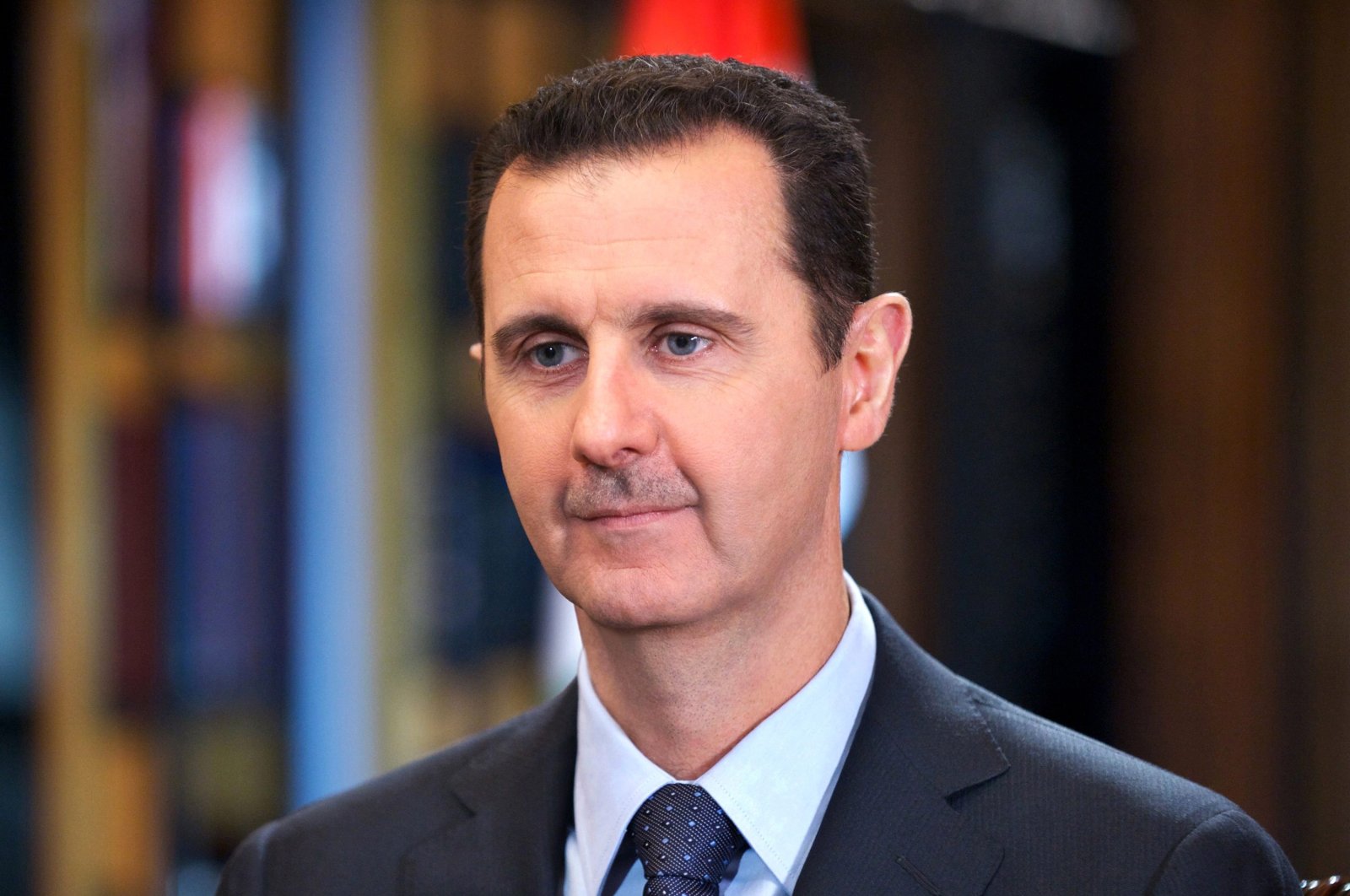 Syria's Bashar Assad speaks during an interview with Venezuela's state-run Telesur network, in Damascus, Syria, Sept. 25, 2013. (AP Photo)