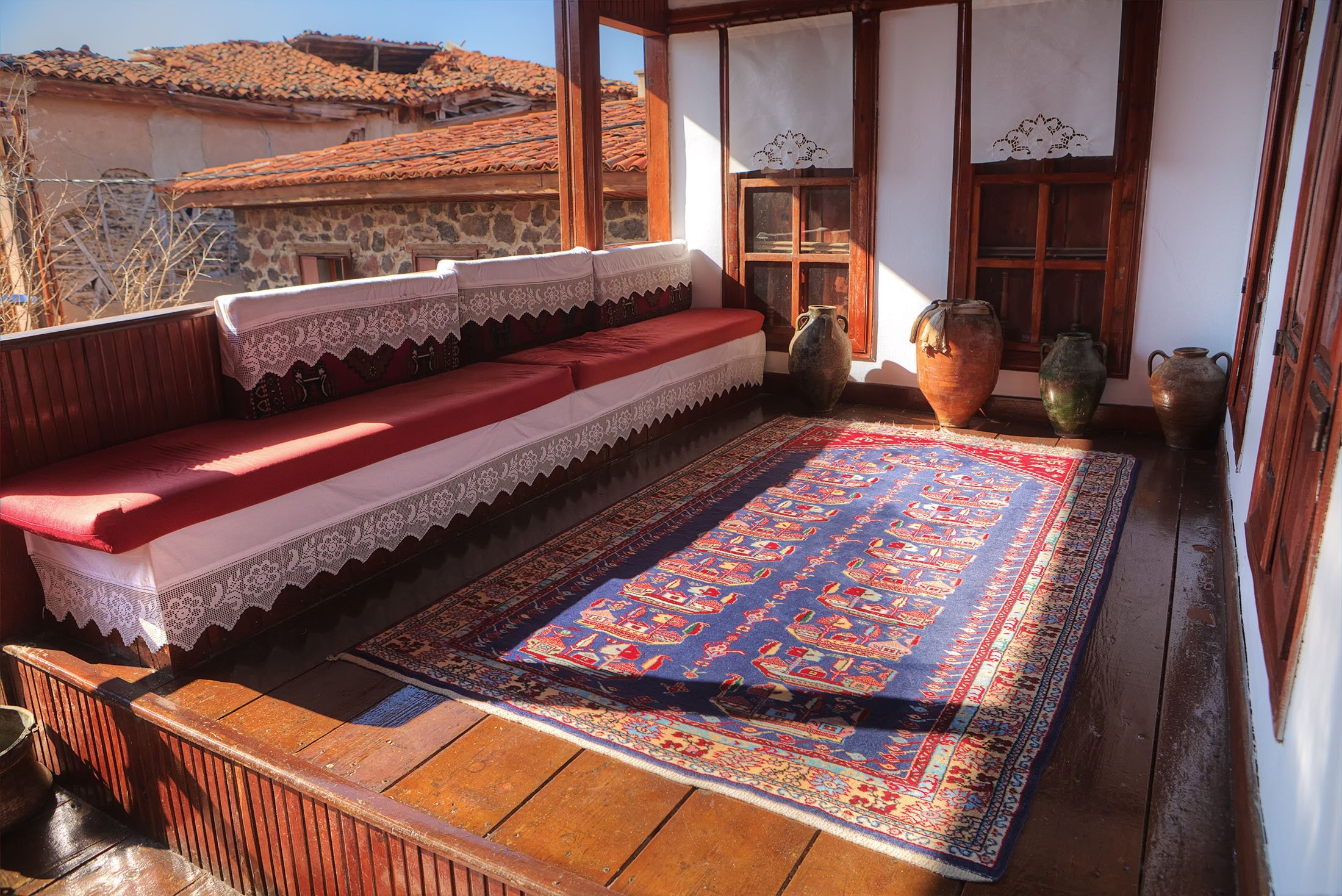 A traditional carpet and the interior of Kula houses in Manisa, Turkey. (Shutterstock Photo)