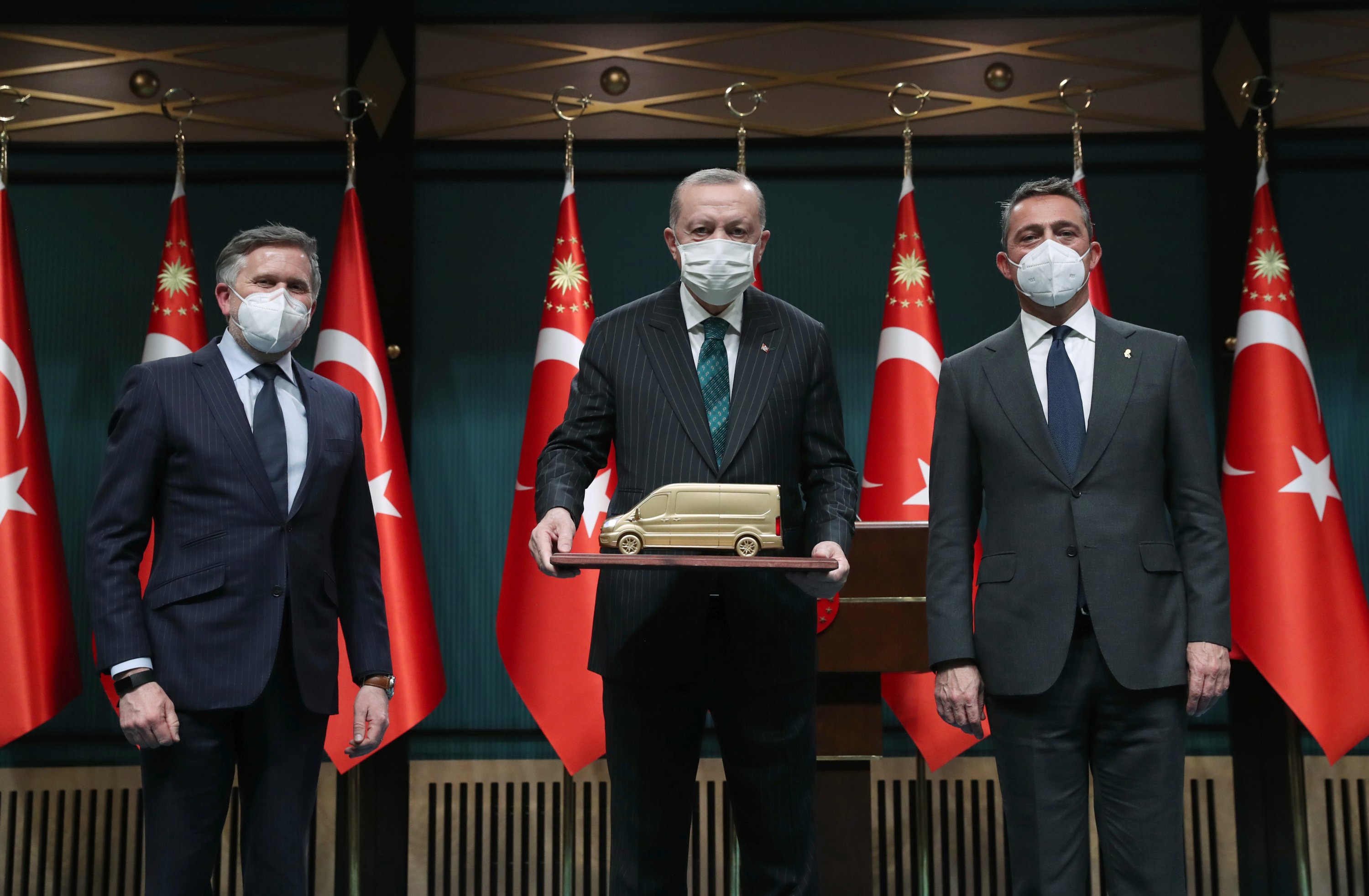 President Recep Tayyip Erdoğan (C), Ford Otosan Chairman of the Board Ali Koç (R) and Ford's Europe Chief Stuart Rowley during a meeting in the capital Ankara, Turkey, March 16, 2021. (AA Photo)