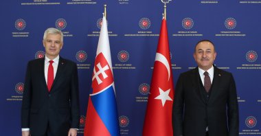 Foreign Minister Mevlüt Çavuşoğlu stands with his Slovak counterpart Ivan Korcok in Ankara, Turkey, March 16, 2021. (AA)