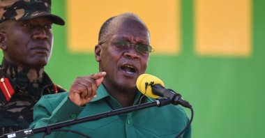 Tanzania's President and presidential candidate of ruling party Chama Cha Mapinduzi (CCM) John Magufuli (R) speaks during the official launch of the party's campaign for the October general election at the Jamhuri stadium in Dodoma, Tanzania, Aug. 29, 2020. (AFP Photo)