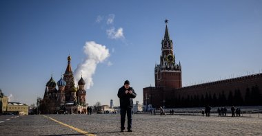 A man uses his mobile phone on Red Square in downtown Moscow, Russia, March 10, 2021. (AFP Photo)