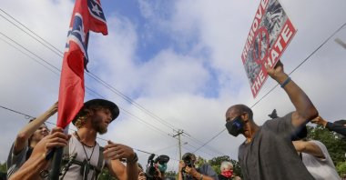 Protesters and counterprotesters face off in Stone Mountain Village, Georgia, U.S., Aug. 15, 2020. (AP)