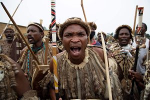 Zulu regiments, also known as amaButho, make their way to the mortuary to receive the body of King Goodwill Zwelithini from in Nongoma, KwaZulu Natal, South Africa, March 17, 2021. (AFP Photo)