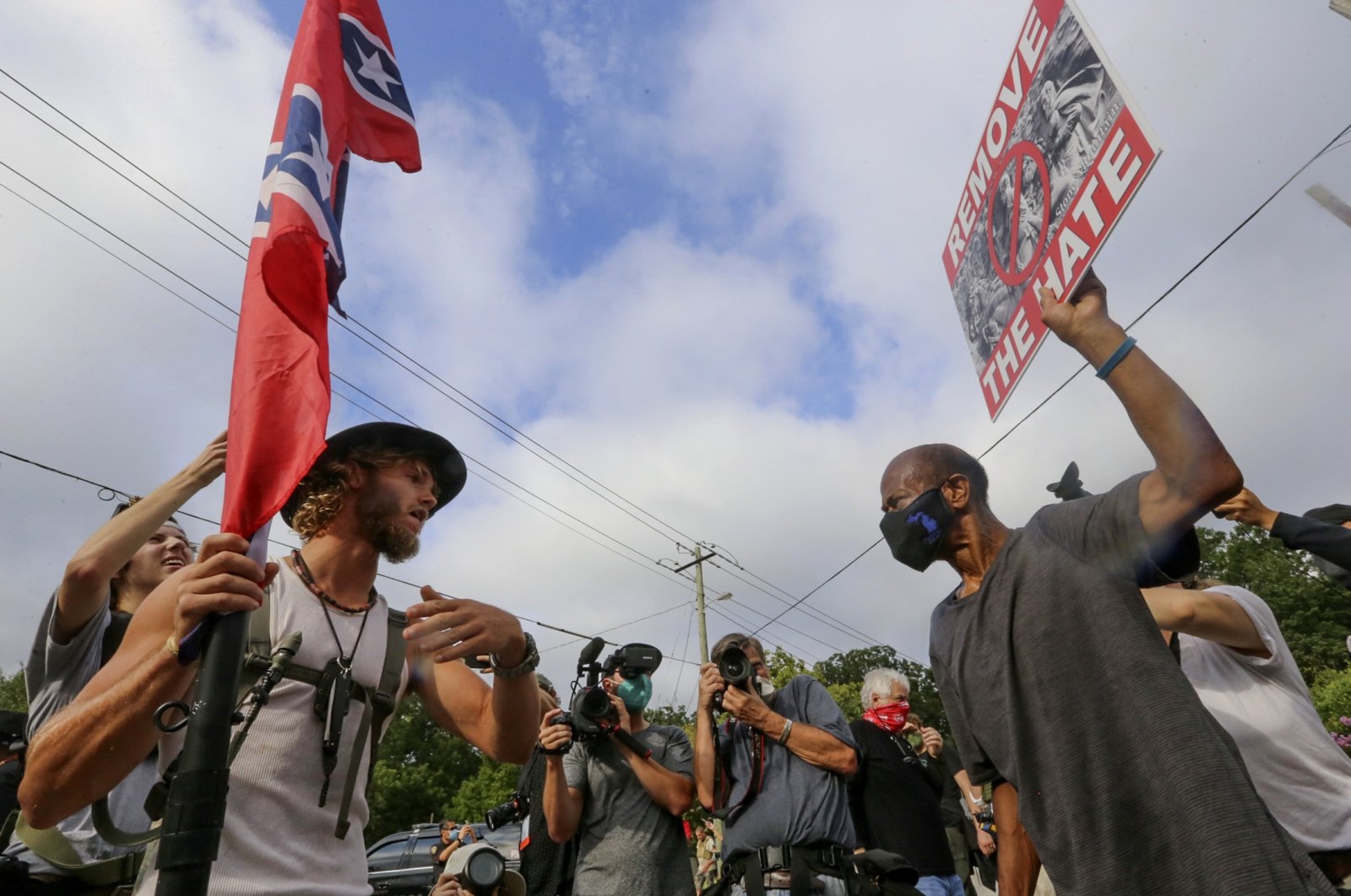 Protesters and counterprotesters face off in Stone Mountain Village, Georgia, U.S., Aug. 15, 2020. (AP)