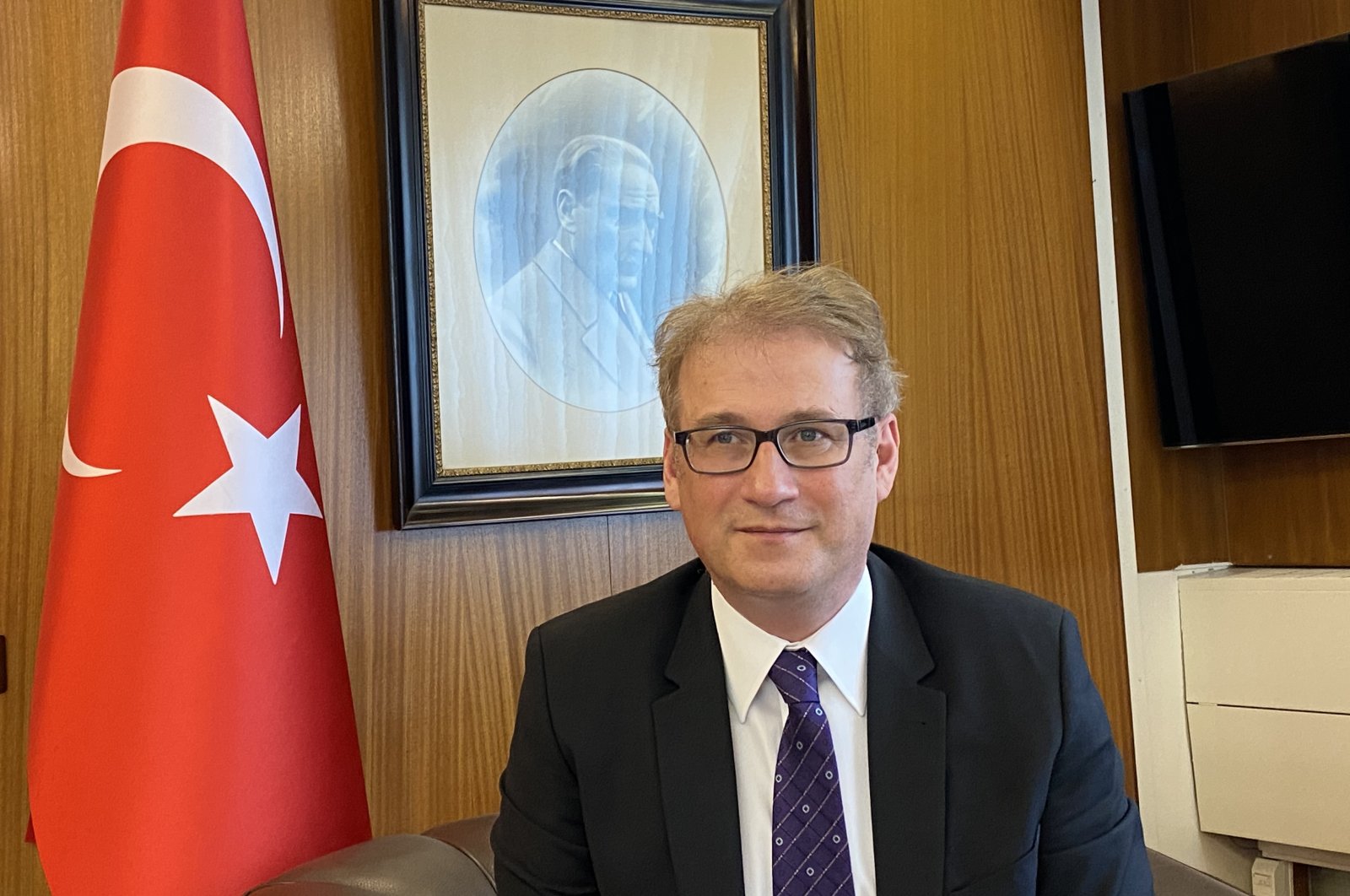 Turkey's ambassador to Bern Ilhan Saygılı speaks to AA in an interview, Bern, Switzerland, March 17, 2021. (AA)