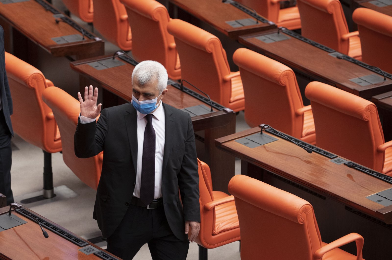 Then-HDP deputy Ömer Faruk Gergerlioğlu waves after a session in the Turkish Parliament, Ankara, Turkey, March 17, 2021. (AA)