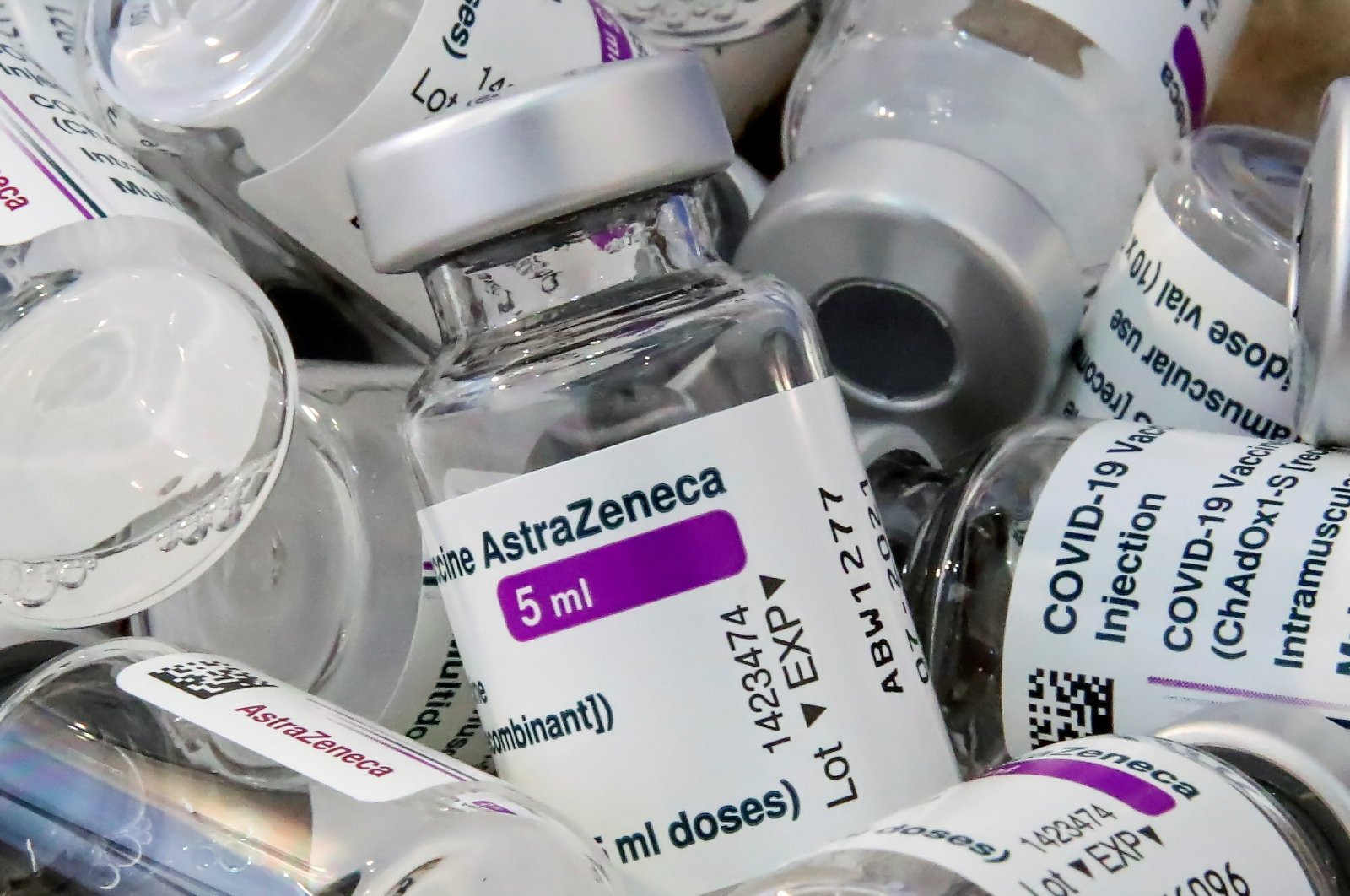 Empty vials of AstraZeneca's COVID-19 vaccine are pictured amid a vaccination campaign in Bierset, Belgium, March 17, 2021. (REUTERS)