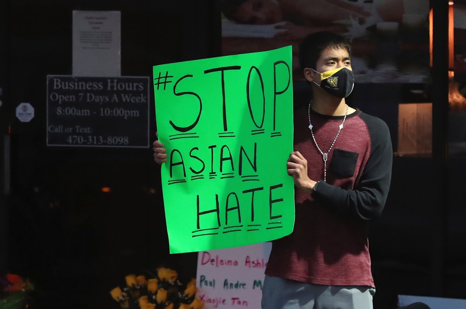 Jesus Estrella stands outside Young’s Asian Massage where four people were killed Tuesday, Atlanta, Georgia, U.S., March 17, 2021. (AP Photo)