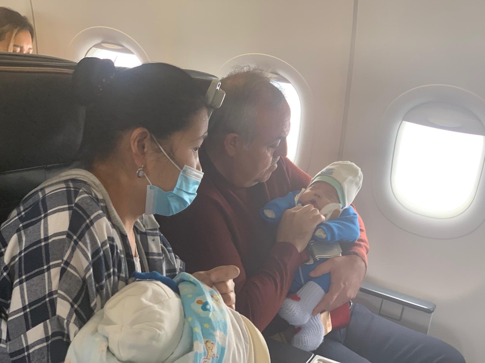 turkish lawmaker saves choking baby on bishkek istanbul flight daily sabah