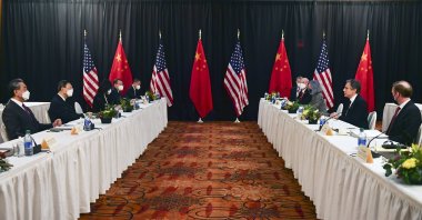 China's State Councilor Wang Yi (L) and Chinese Communist Party foreign affairs chief Yang Jiechi (2nd from L) listen as Secretary of State Antony Blinken (2nd from R) speaks while sitting next to National Security Adviser Jake Sullivan (R) during the opening session of US-China talks at the Captain Cook Hotel in Anchorage, Alaska, March 18, 2021. (AP Photo)