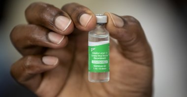 A nurse holds a vial of AstraZeneca COVID-19 vaccine provided through the global COVAX initiative, at Kenyatta National Hospital in Nairobi, Kenya, March 5, 2021. (AP Photo)
