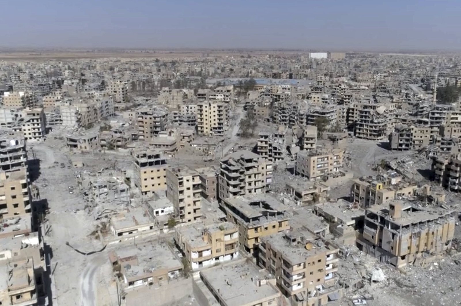 A screengrab from drone video shows damaged buildings in Raqqa, Syria, Oct. 19, 2017. (AP Photo)