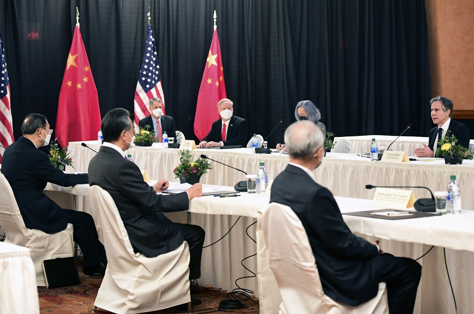 Secretary of State Antony Blinken, speaks as Chinese Communist Party foreign affairs chief Yang Jiechi, left, and China's State Councilor Wang Yi, second from left, listen at the opening session of U.S.-China talks at the Captain Cook Hotel in Anchorage, Alaska, Thursday, March 18, 2021. (AP Photo)