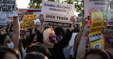 A woman holds a sign that reads "İpek Tekin could have been alive if Istanbul Convention was implemented" during a women's rights protest in Istanbul, Turkey, Aug. 5, 2020. (Getty Images)
