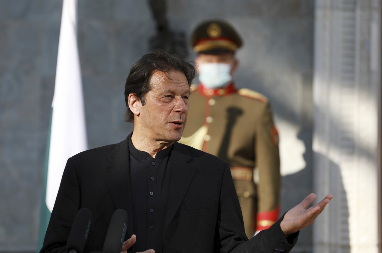 Pakistan Prime Minister Imran Khan speaks during a joint news conference with Afghan President Ashraf Ghani at the Presidential Palace in Kabul, Afghanistan, Nov. 19, 2020. (AP Photo)