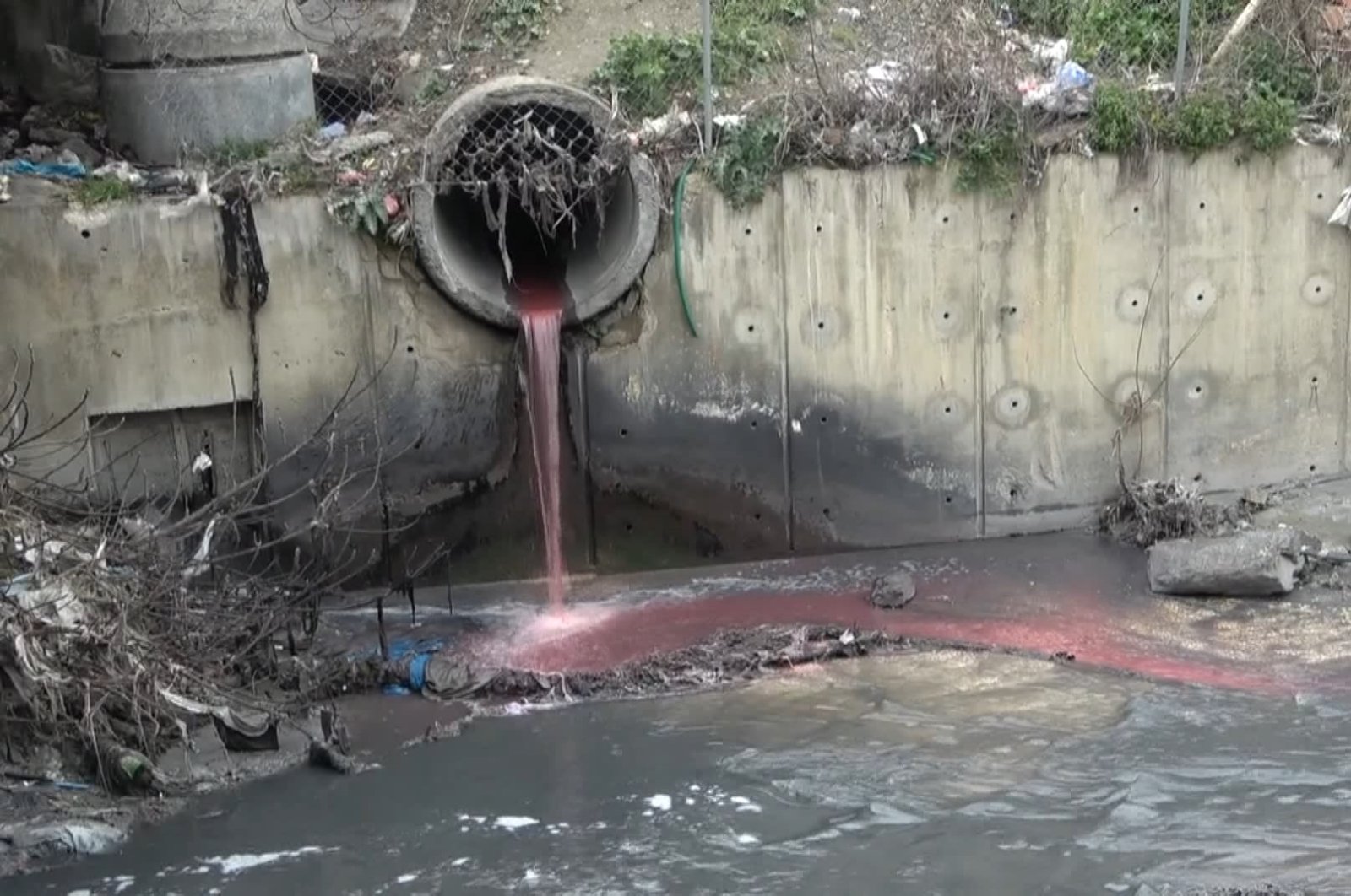 Pink water pours into Haramidere creek in Esenyurt district, Istanbul, Turkey, March 20, 2021. (DHA Photo)