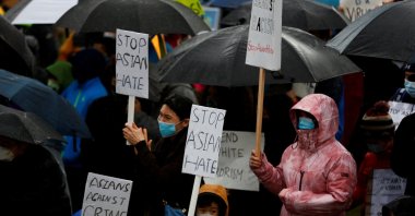 People attend a "Stop Asian Hate" rally and vigil to remember the Atlanta shooting victims at Bellevue Downtown Park in Bellevue, Washington, U.S. March 20, 2021. (Reuters Photo)