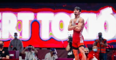 Turkish wrestler Kerem Kamal celebrates after beating Hungary's Erik Torba in the European Olympic Qualifier, Budapest, Hungary, March 20, 2021. (IHA Photo)