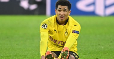 Dortmund's English midfielder Jude Bellingham sits on the pitch during the UEFA Champions League match against Lazio in Dortmund, western Germany, Dec. 02, 2020. (AFP Photo)