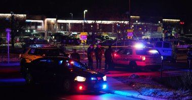 Police and officials investigate the scene of a mass shooting at the King Soopers supermarket in Boulder, Colorado, U.S., March 22, 2021. (EPA Photo)